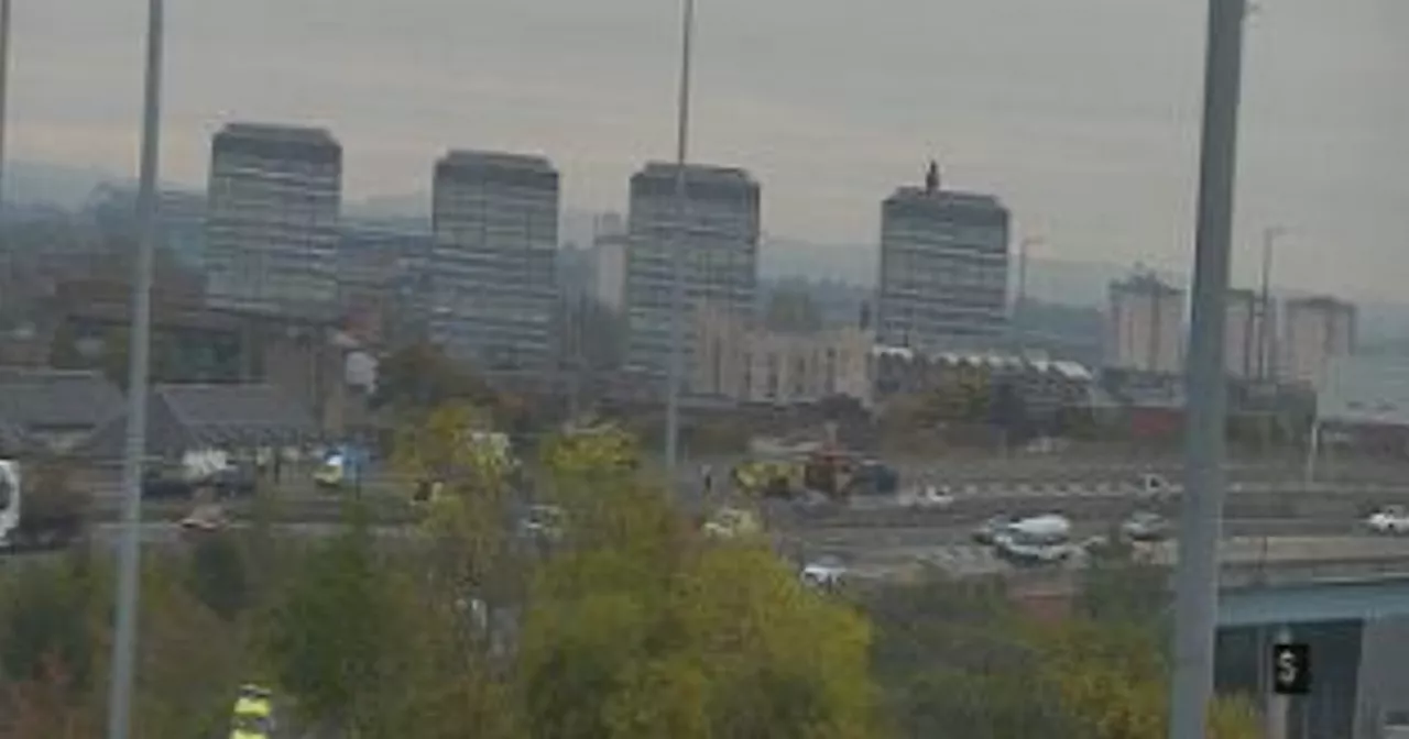 Glasgow's M74 closed after vehicle bursts into flames with emergency crew on scene