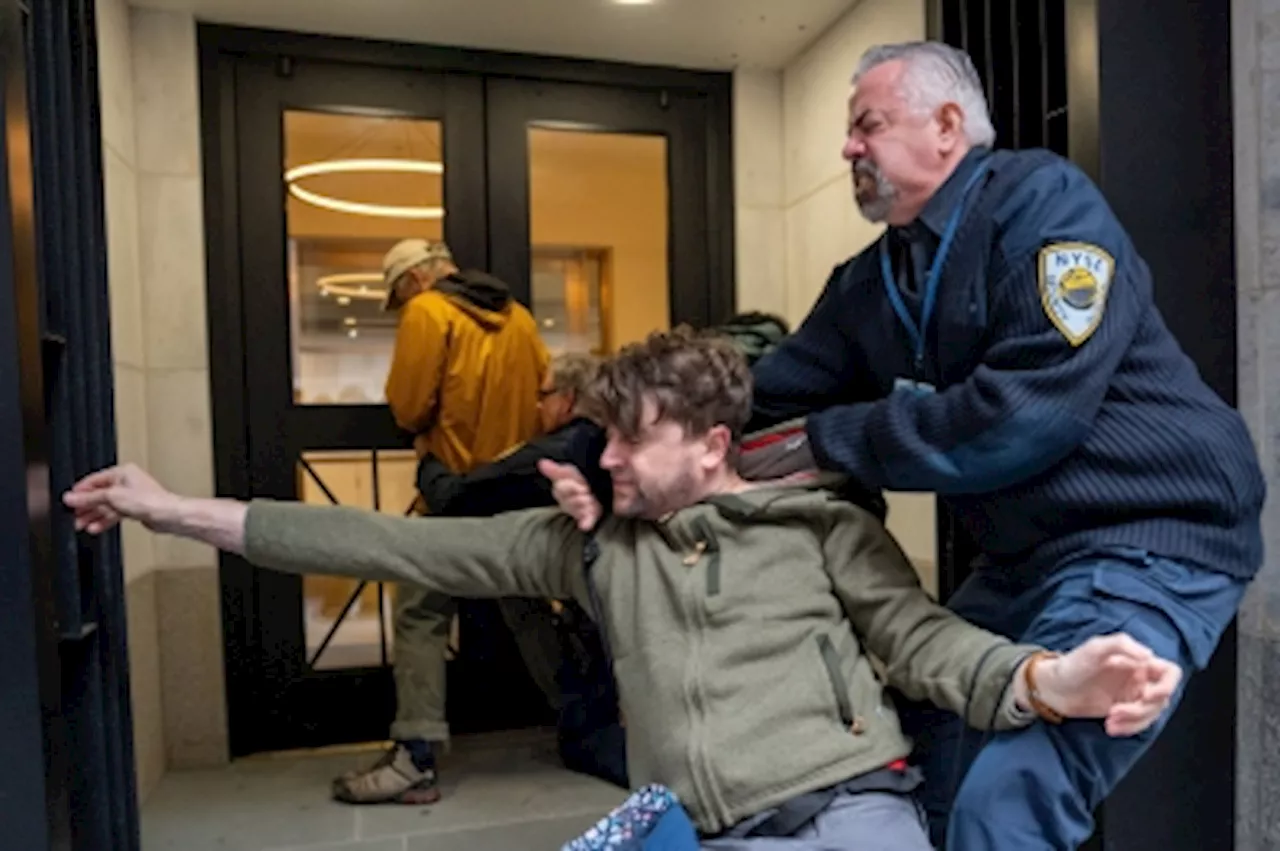 NY police arrest over 200 pro-Palestinian protesters at Wall Street sit-in over US support for Israel