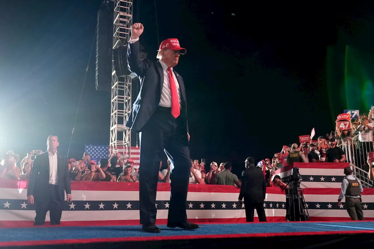 Man arrested outside Trump rally says guns were for his protection, not assassination