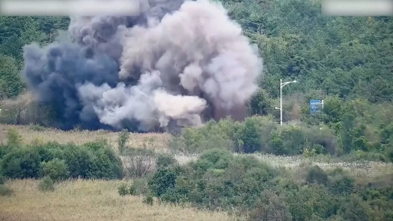 Explosions seen across the border as North Korea blows up roads linking it to South Korea