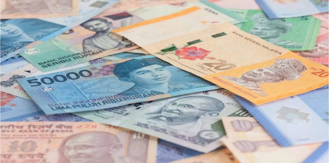 Asian FX loses ground on dollar strength; key cenbank decisions awaited