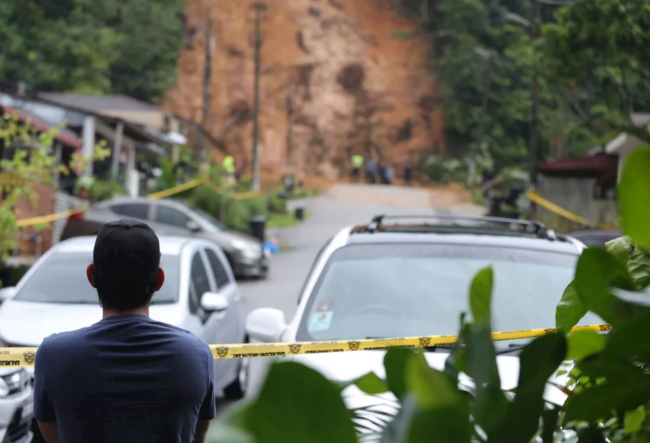 Large sheet to cover Taman Melawati landslide site to prevent further erosion