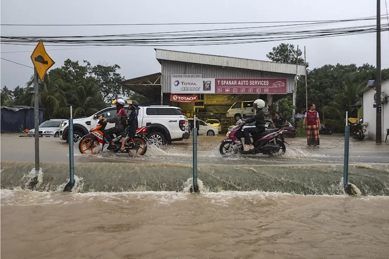 Kuala Lumpur and nearby districts hit by flash floods, landslide in a residential estate