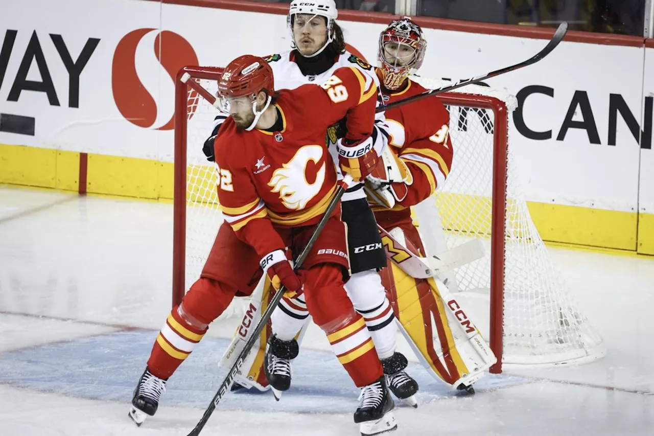 Coronato scores twice, unbeaten Flames edge Blackhawks 3-1