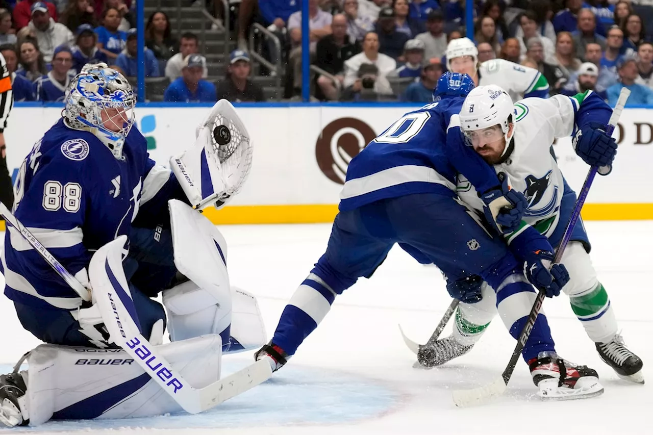 Kucherov Fuels Lightning Past Canucks in Hurricane-Delayed Opener