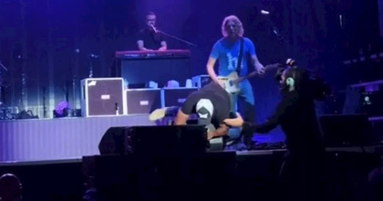 90s rockstar, 58, almost falls off stage in catastrophic moment