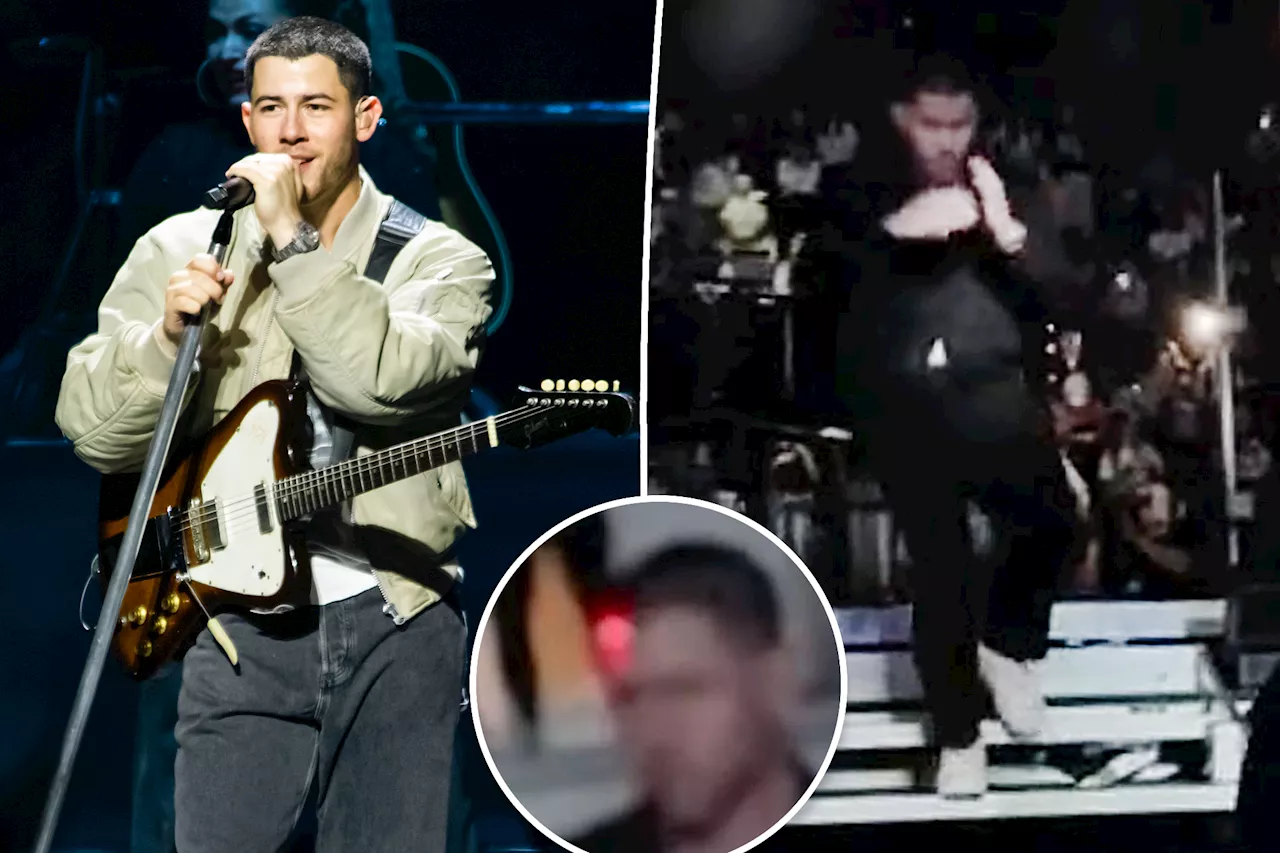 Nick Jonas bolts off stage during Jonas Brothers concert after being lit up with laser