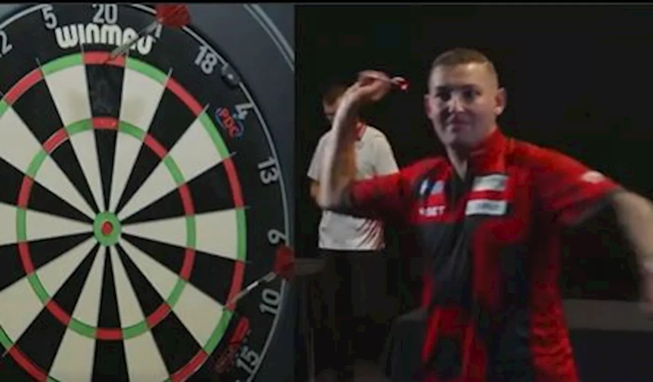 Nathan Aspinall apologises after launching dart at board in anger during match...