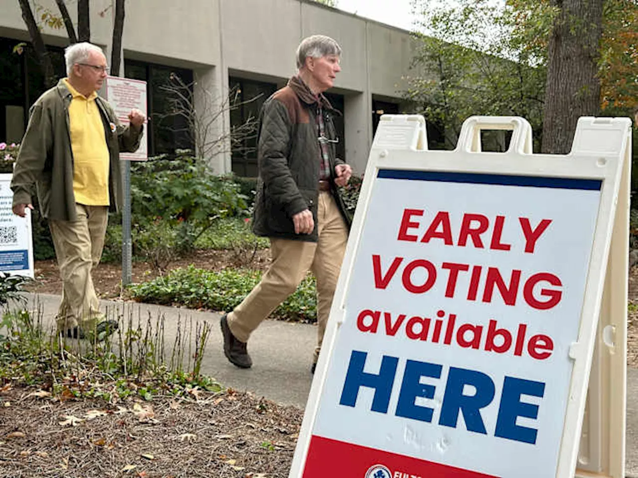 Georgians flock to cast ballots as early in-person voting begins