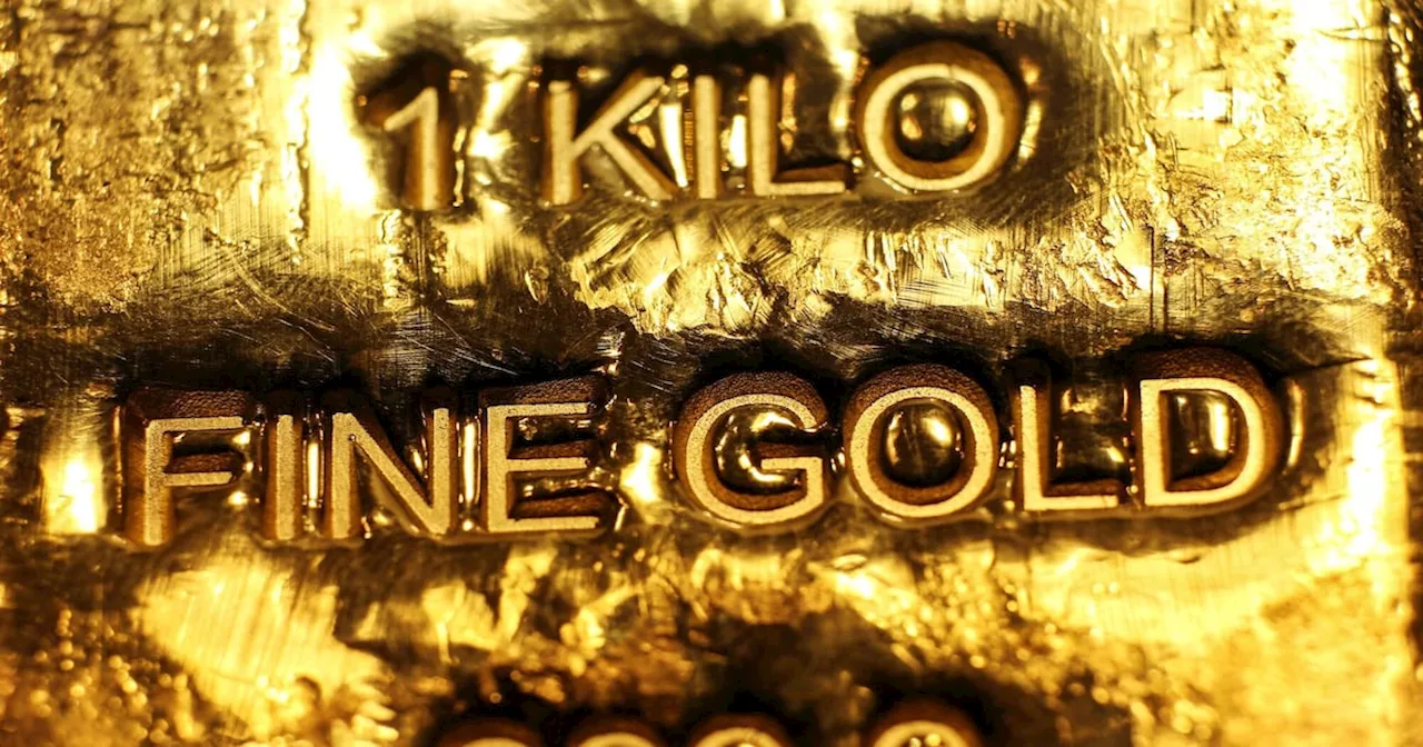 Gold Hits New Record on Mideast Tension as Traders Weigh US Data