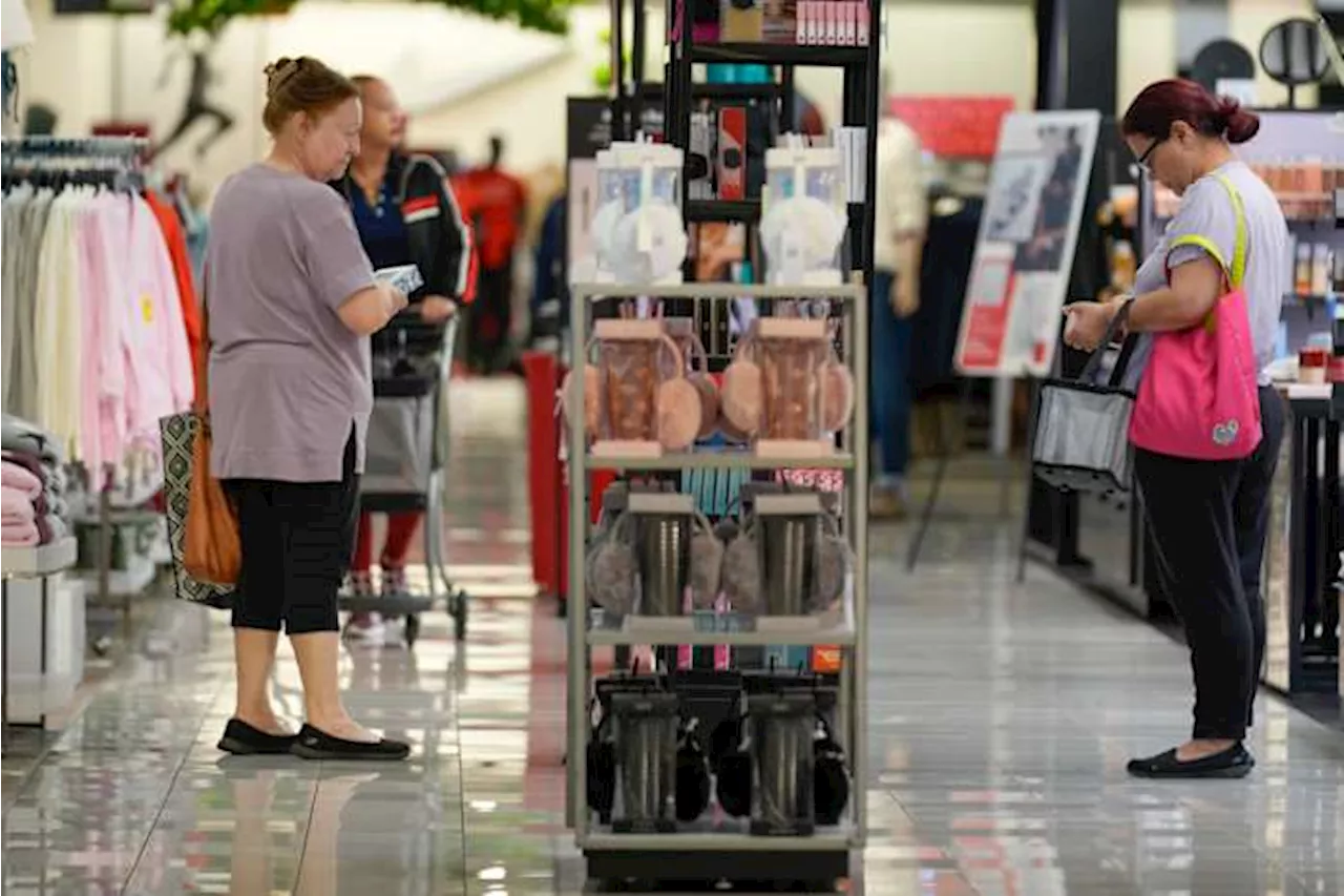 US shoppers spent more at retailers last month in latest sign consumers are driving growth