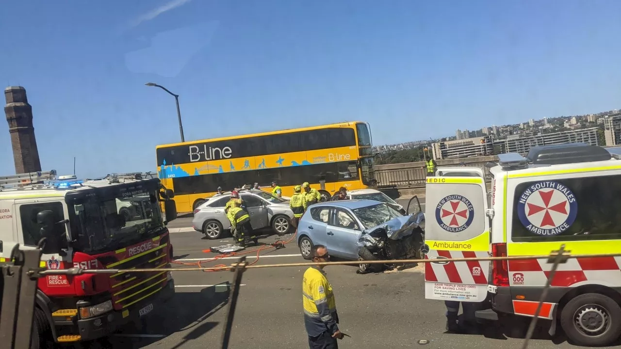 Fatal crash involving bus and three cars on Sydney Harbour Bridge sparks commuter chaos