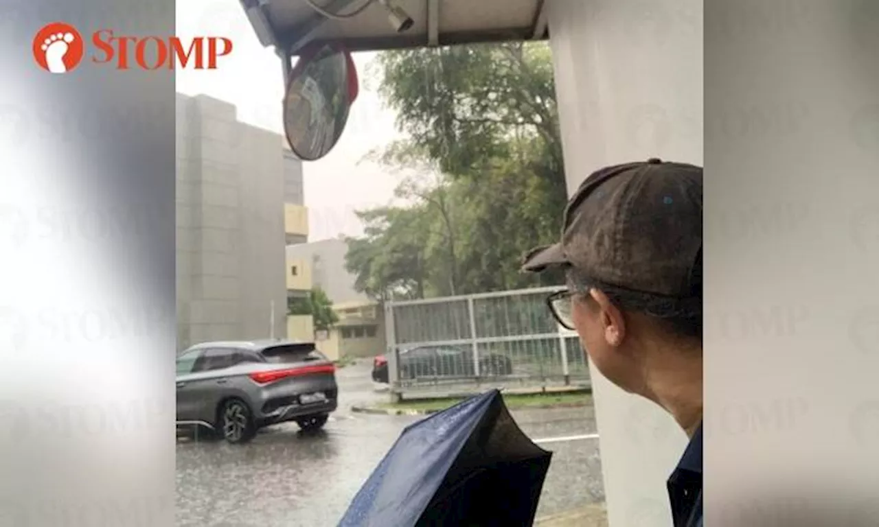 School security guard has to seek shelter at nearby serviced apartment guardhouse in downpour