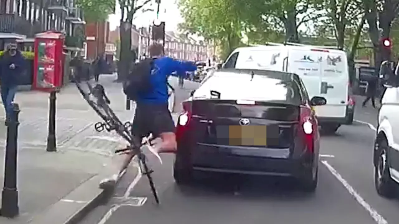 Watch cyclist fly into road rage after HE crashed into car & was knocked off… but viewers noticed driver’s...