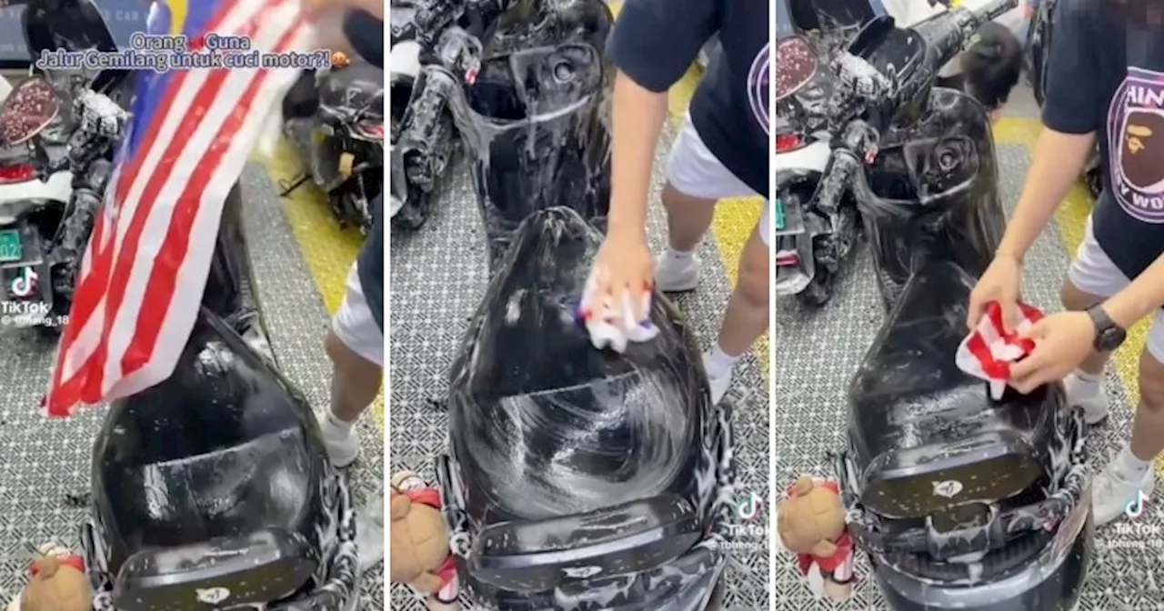 Malaysian Flag Used to Wash Motorcycle in Viral Video Sparks Anger