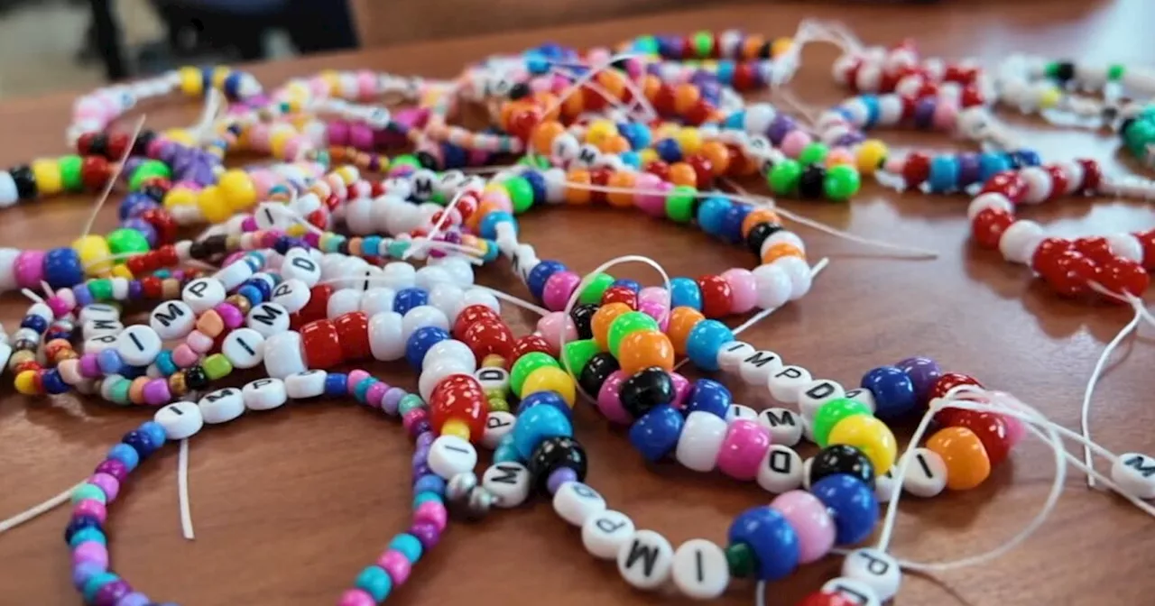 IMPD, students make friendship bracelets ahead of Taylor Swift show