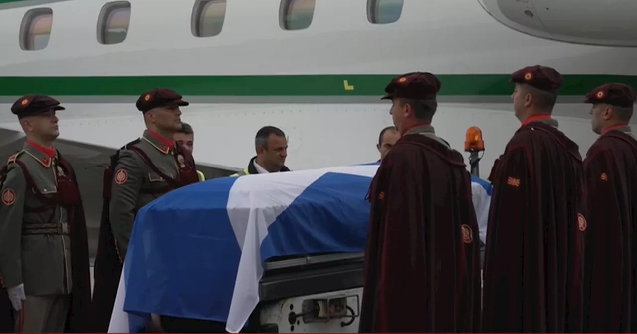 Alex Salmond's coffin draped in saltire as plane carrying body takes off