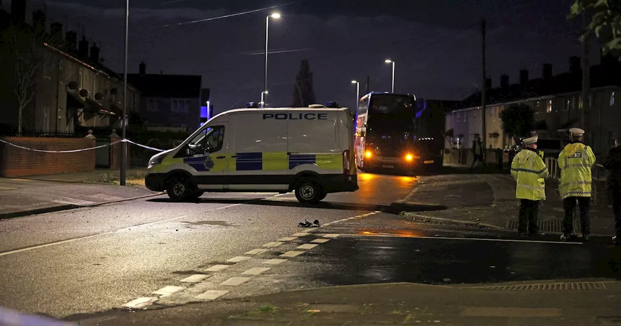 Man rushed to hospital as street cordoned off