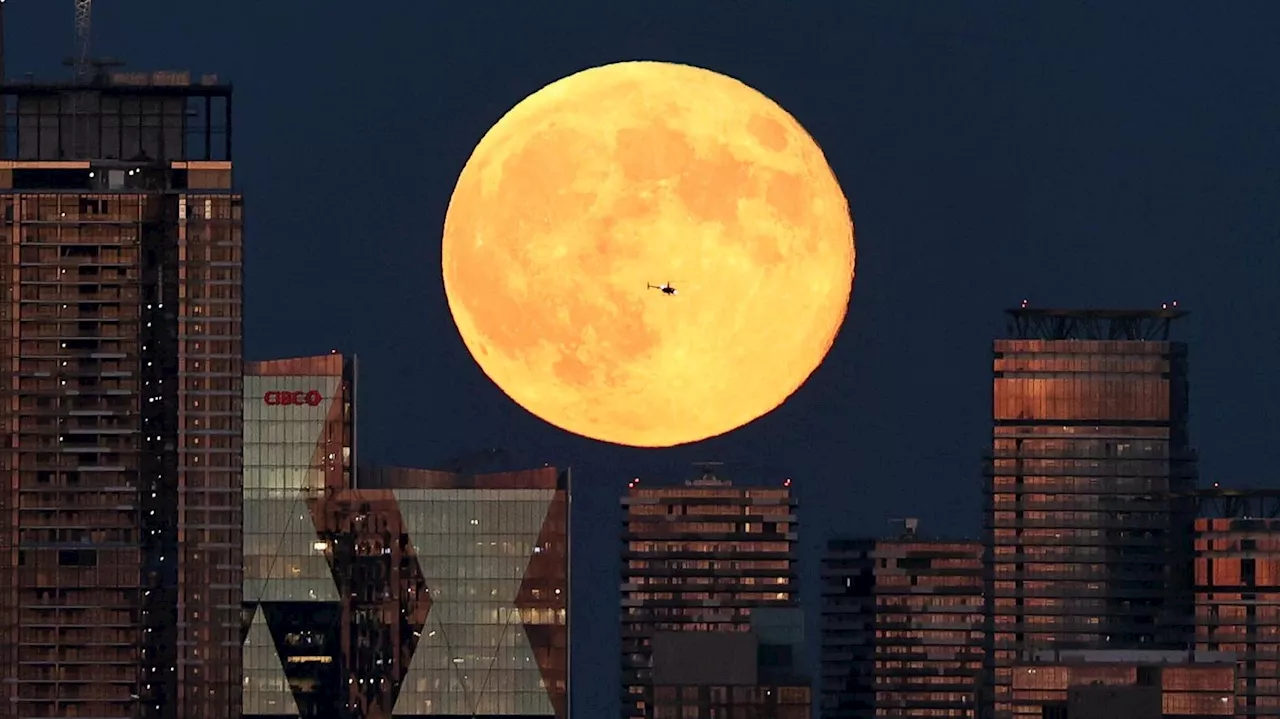 In Photos: Year’s Largest Supermoon Turns Night To Day Across World As Comet Shines