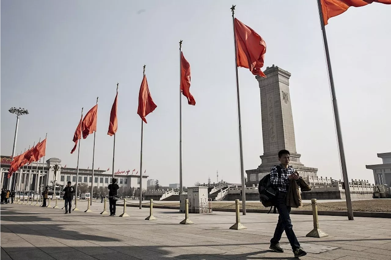 China sees slowest growth in more than a year in third quarter as property woes persist