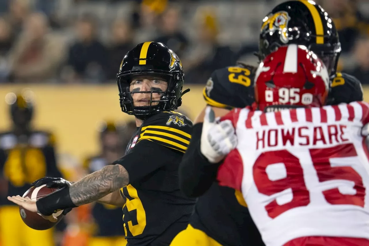 Bo Levi Mitchell's five TD passes lead Ticats past Stampeders 42-20