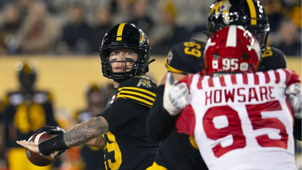 Bo Levi Mitchell's five TD passes lead Ticats past Stampeders 42-20