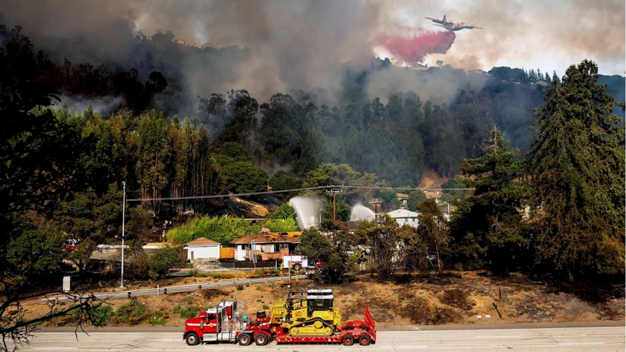 Fast-moving brush fire damages at least 7 homes in neighbourhood of Oakland, California