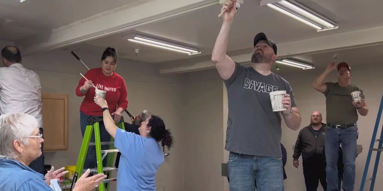 Volunteers turn their paintbrushes to the Fairbanks Senior Center