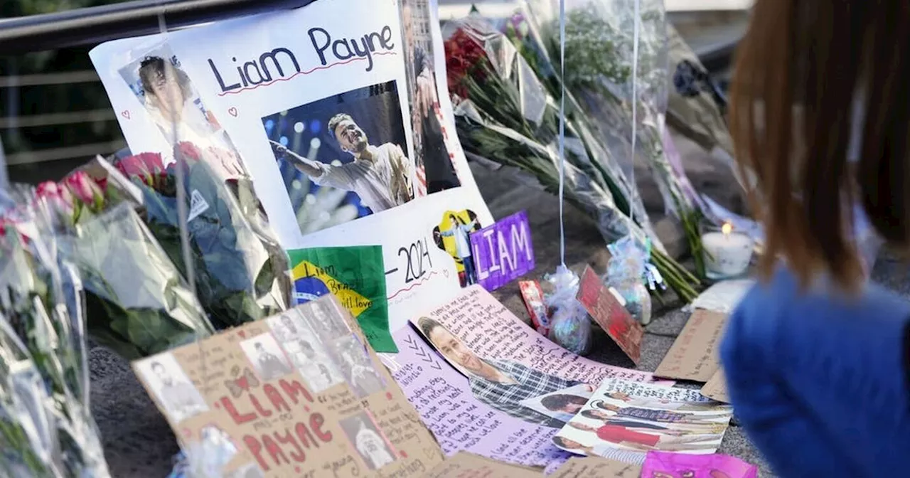 One Direction fans gather in Liverpool for Liam Payne vigil