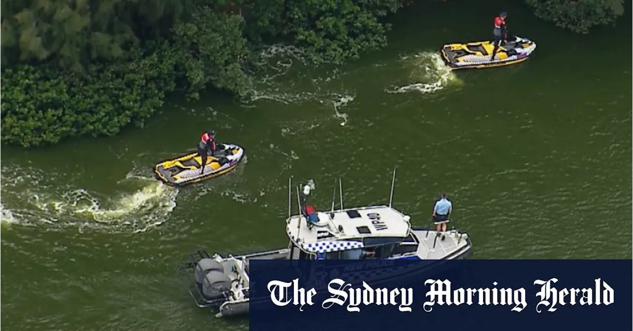 Woman dead, search for two children in waterway in Sydney’s south-west