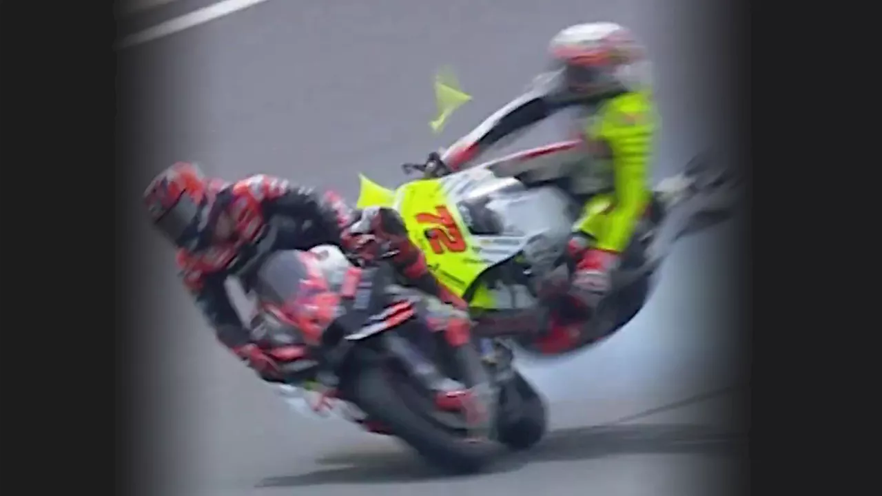 MotoGP star rushed to hospital by air ambulance after terrifying crash with rival as 120mph collision is...