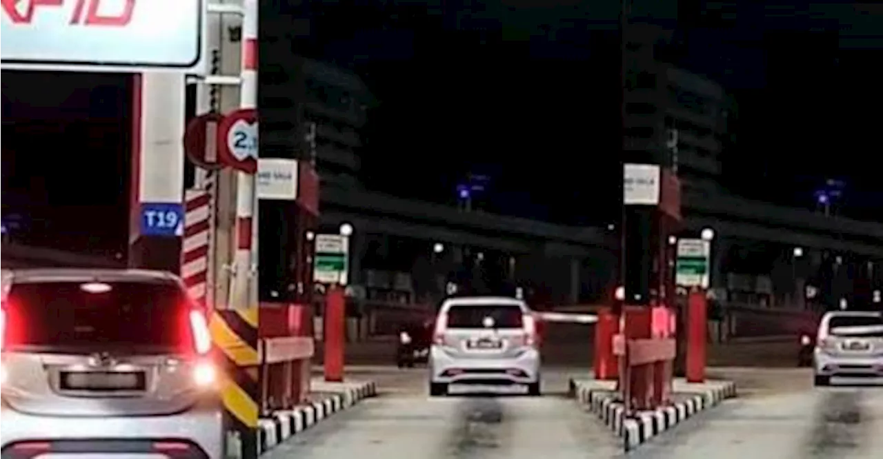 Driver rams RFID toll gate after repeated failures