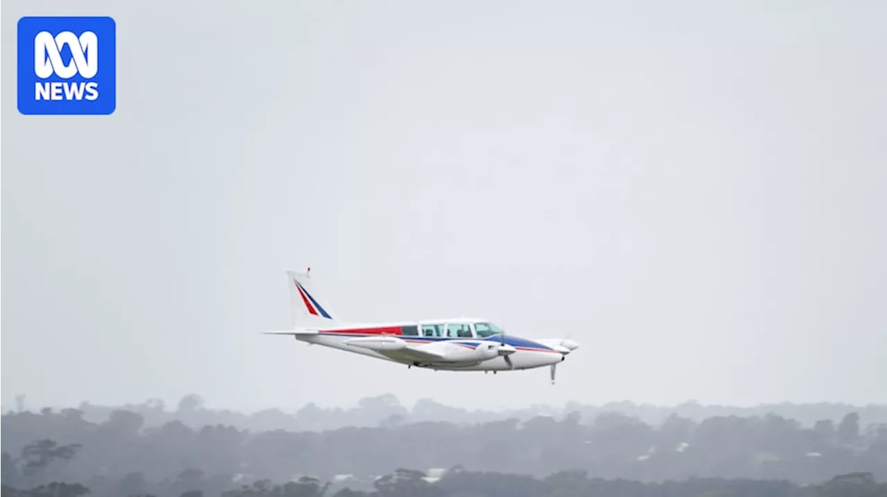 First plane officially lands at Western Sydney Airport, six years after construction began