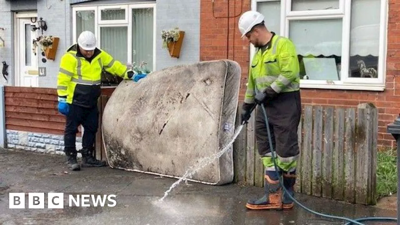 Bootle floods: Floods leave woman's sofa 'floating' in house