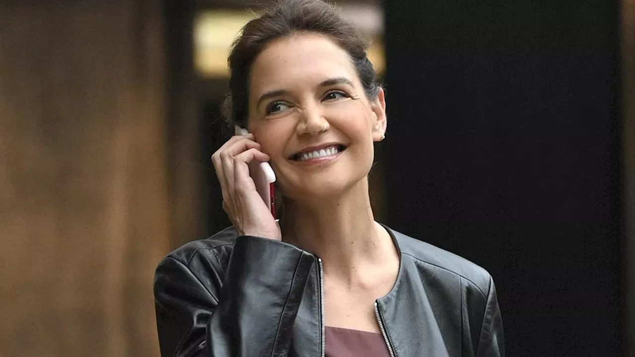 Katie Holmes beams as she enjoys happy phone call in NYC