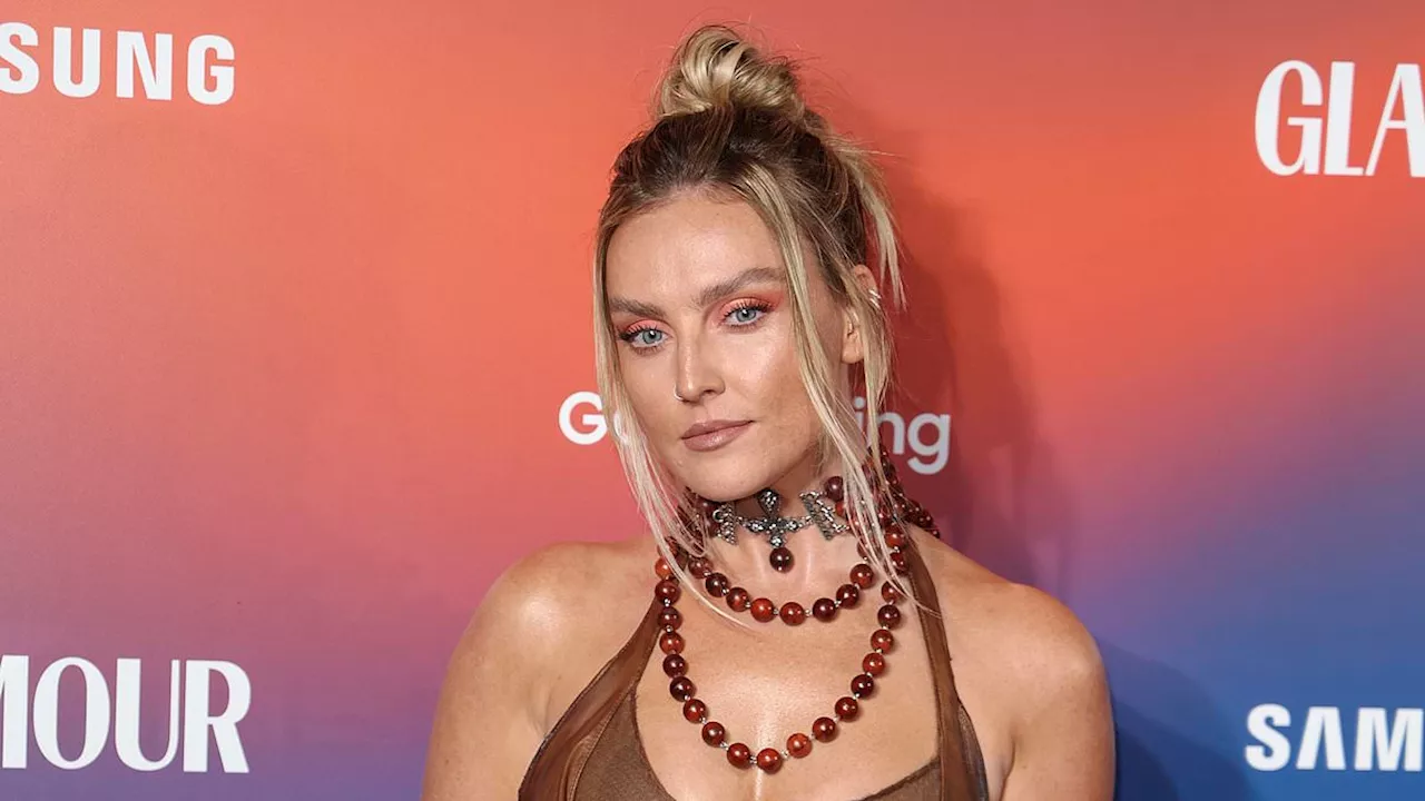 Perrie Edwards sets pulses racing in a brown leather dress adorned with red beading as she steps out...