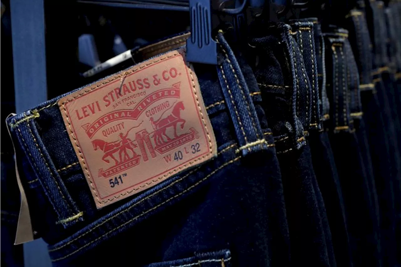 Levi Strauss cuts guidance after Q3 revenue miss; mulls Dockers sale