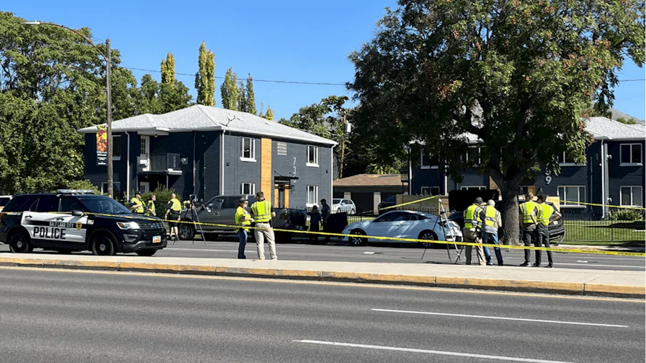 Woman walking on sidewalk killed after car loses control, crashes into parked car in SLC