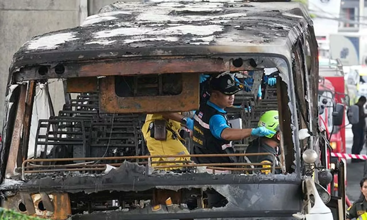 Thai police arrest driver and work to identify victims of school bus fire that killed 23