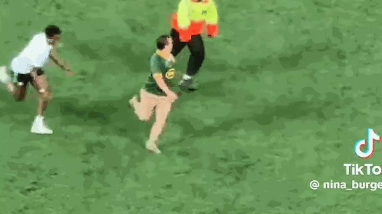 Wild moment pitch invader is knocked out by security guard during Rugby Championship clash