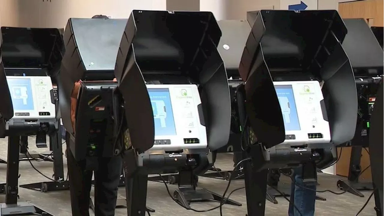 Elections workers testing voting machines in Franklin County before early voting starts