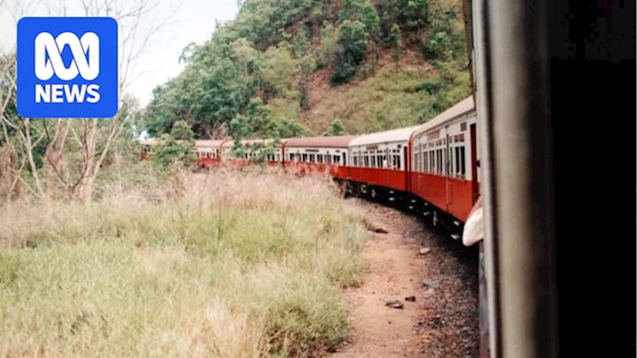 Police search CCTV after five-year-old boy struck by rock on Kuranda tourist train in Cairns