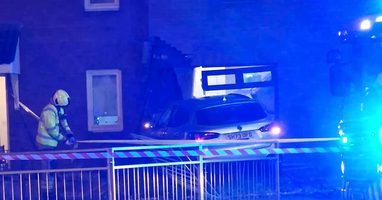 Glasgow house evacuated after car crashes into Govan property as two men arrested