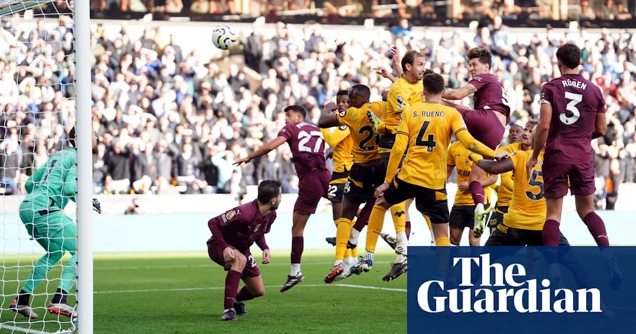 John Stones’ injury-time header gives Manchester City dramatic win at Wolves