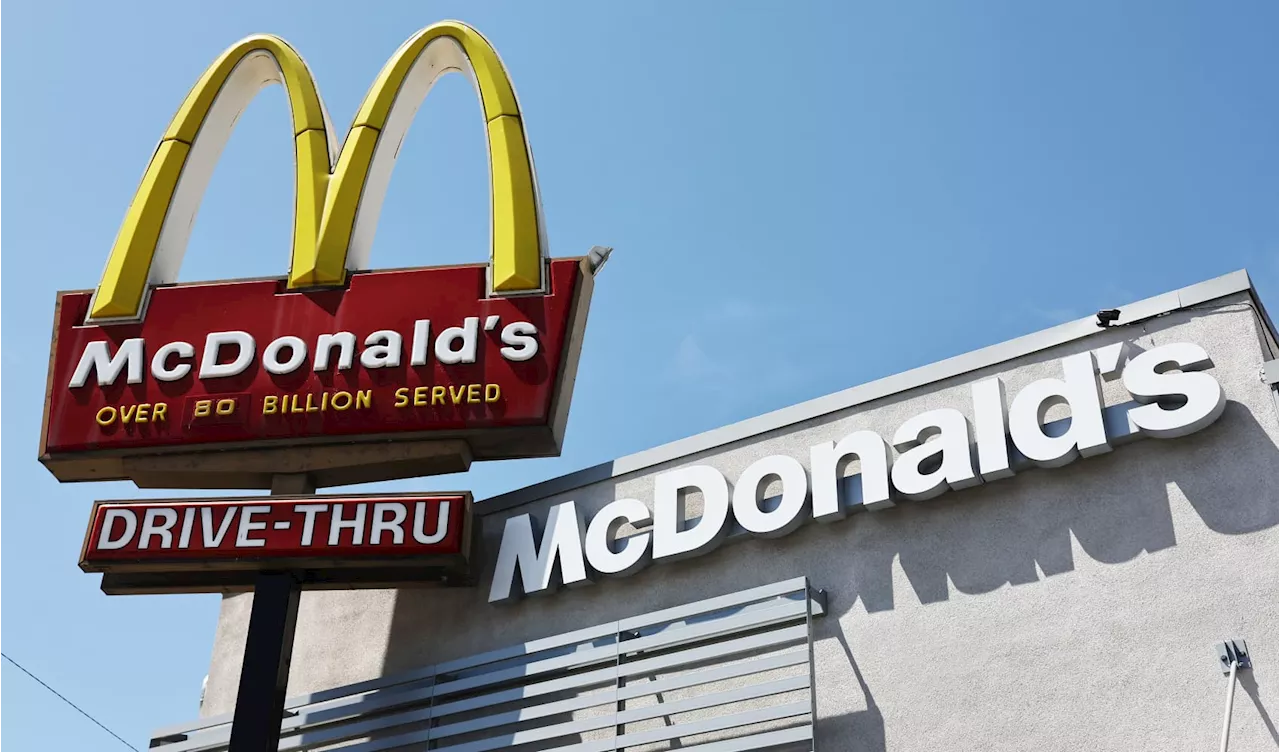 Trump Serves Up Fries at McDonald's, Takes Aim at Harris