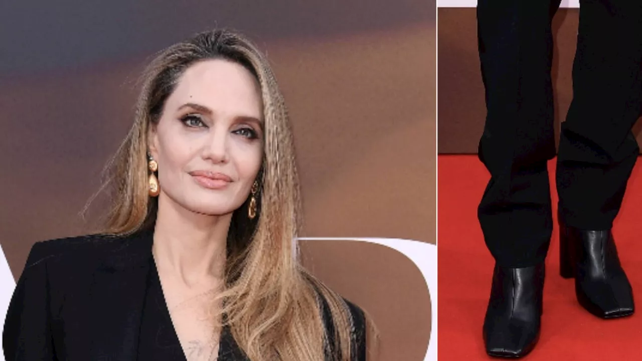 Cómo llevar pantalones slim con botines de tacón como Angelina Jolie en otoño 2024