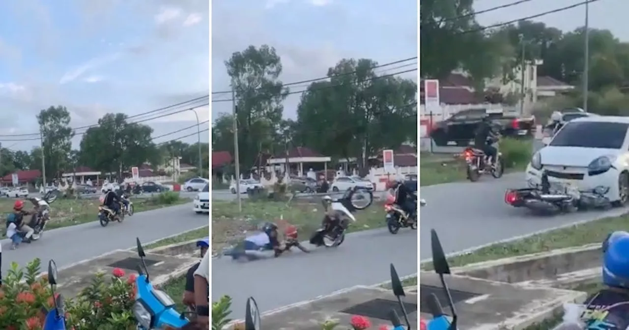 Rempits Crash After Failed Wheelie Attempt, Motorbike Hits Innocent MyVi & Damages its Bumper