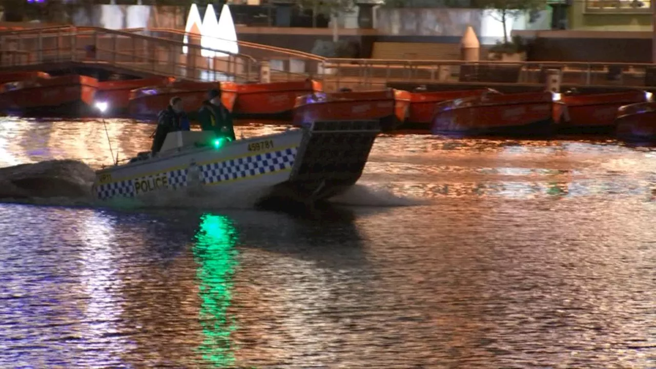 Two arrested and weapons seized after investigations into body of man found in Yarra River