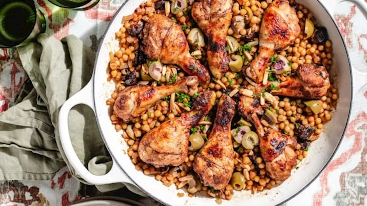 Make juicy one-pan chicken with pearl couscous and Moroccan spices for a satisfying weeknight dinner