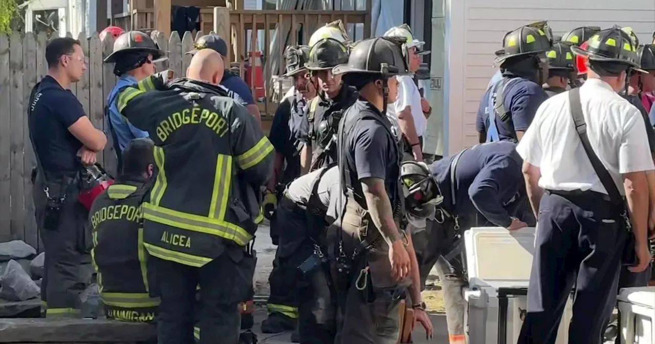 Construction worker 'buried up to his knee' in collapse at 100-year-old home in Connecticut